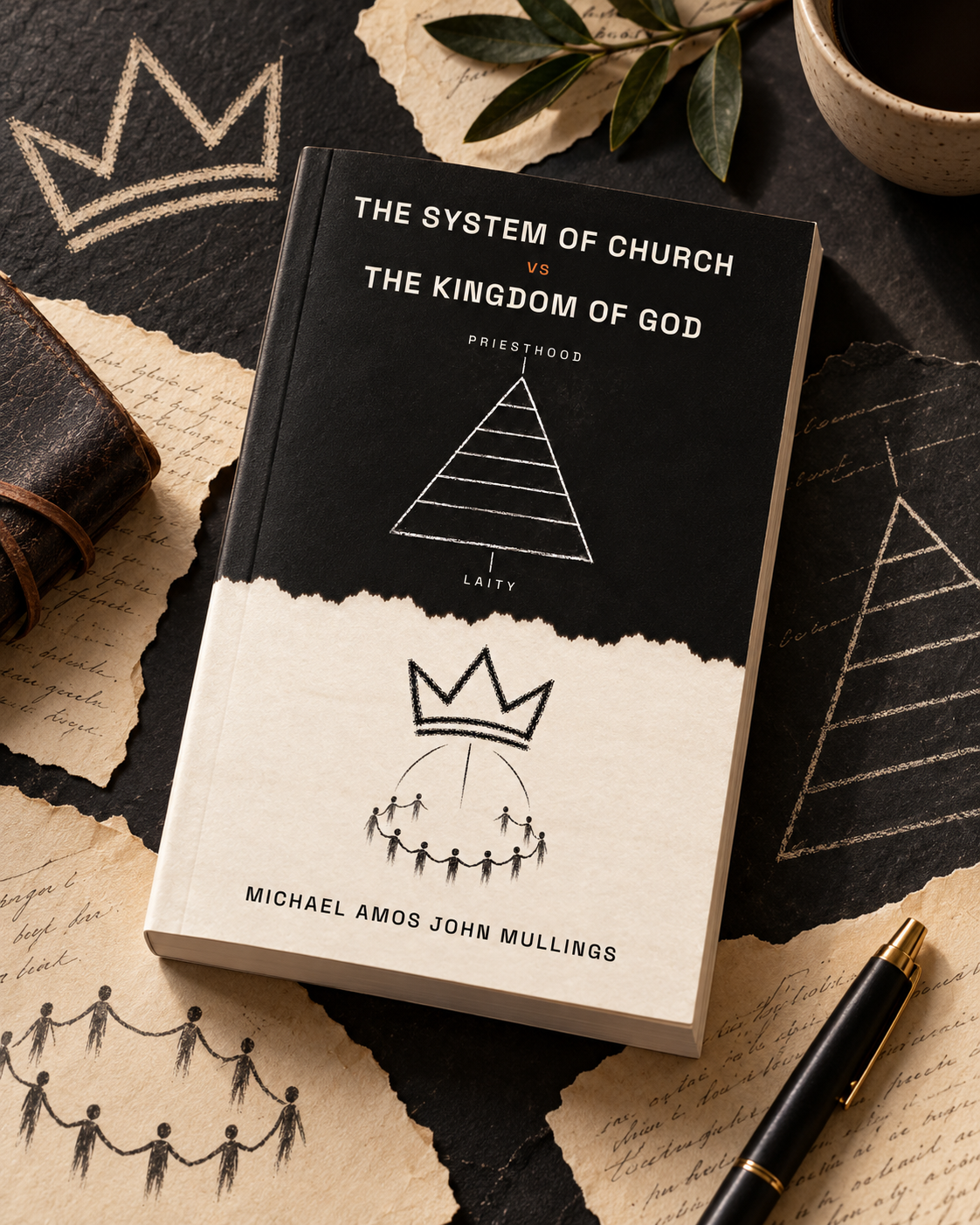 The book viewed from above beside handwritten notes and a pen